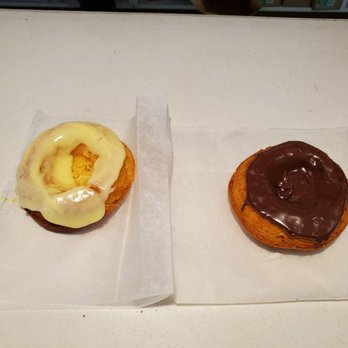 Sesame Donuts - Two gluten-free donuts, one with lemon one with chocolate frosting. - Donuts Near Me - Portland, Oregon Sesame Donuts - Two gluten-free donuts, one with lemon one with chocolate frosting. - Donuts Near Me - Portland, Oregon