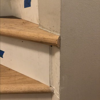 Blackwater Home Renovation - example of Austin's sub-par work; the ugly way the stair-tread intersects the wall is not only ugly, but per the building inspector, unsafe - General Contractors Near Me