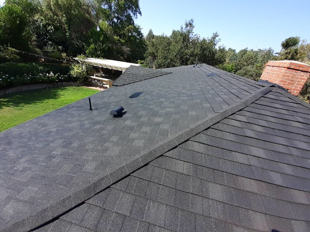 Slide of Reno's Roofing