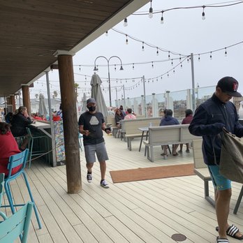 Wooly's - Outdoor seating with view of beach. - Seafood Near Me - Pismo Beach, California