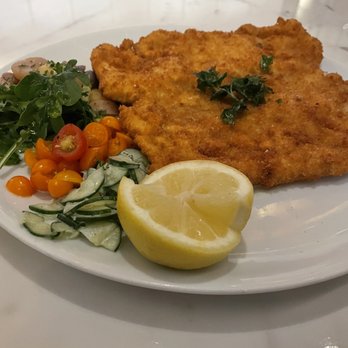 Spago - Veal Wiener Schnitzel, Marinated Cucumbers, Fingerling Potatoes, Tomatoes - New American Near Me - Las Vegas, Nevada