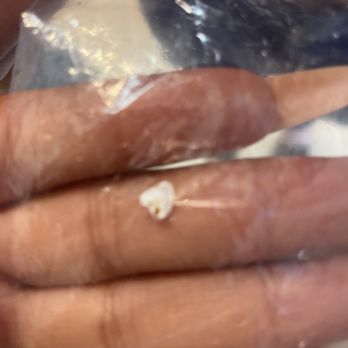 Burger King - a person holding a knife and a plastic bag - Burgers Near Me - Taft, California
