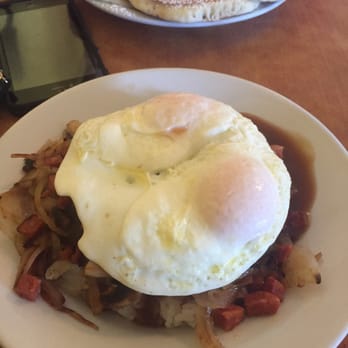 Eggs 'n Things - Hawaiian loco moco with pineapple pancakes in the background. - Breakfast & Brunch Near Me - Honolulu, Hawaii