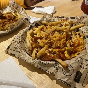 Wayback Burgers - Left corner - chili cheese fries Right- bacon cheese fries - Sandwiches Near Me - Huntsville, Alabama Wayback Burgers - Left corner - chili cheese fries Right- bacon cheese fries - Sandwiches Near Me - Huntsville, Alabama