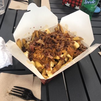 Smoke’s Poutinerie - Double pork large size ($18.06) - Poutineries Near Me - Mississauga, Ontario Smoke’s Poutinerie - Double pork large size ($18.06) - Poutineries Near Me - Mississauga, Ontario