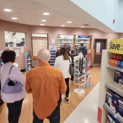 Walgreens - This is how long the line is. I am in too much pain to be standing for this long...