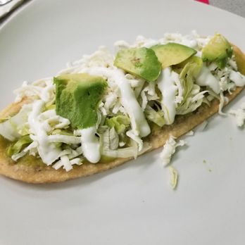 Yetla's Restaurant & Deli - Bean Tlacoyo topped with savory green sauce, crisp lettuce, onions, avocado and sour cream. Delicious!!! - Delis Near Me - Cedar Grove, New Jersey Yetla's Restaurant & Deli - Bean Tlacoyo topped with savory green sauce, crisp lettuce, onions, avocado and sour cream. Delicious!!! - Delis Near Me - Cedar Grove, New Jersey