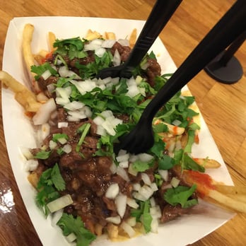 Fat Bao - Fat Fries (hand-cut fries topped with bulgogi, cilantro, onions, kimcheenaise dip & sriracha) - Chinese Near Me - Houston, Texas Fat Bao - Fat Fries (hand-cut fries topped with bulgogi, cilantro, onions, kimcheenaise dip & sriracha) - Chinese Near Me - Houston, Texas