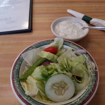 Socios Pizza-Pasta - Garden salad   1 slice cucumber salad, 2 cherry tomatoes, onions , lettuce , green pepper slices, few lettuce with brownish edges - Pizza Near Me - Pace, Florida