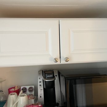 Nobleton Hotel - water, coffee and tea- coffee maker and microwave. Cabinets above have plates and utensils, wine/beer bottle opener - Hotels Near Me - Fort Lauderdale, Florida