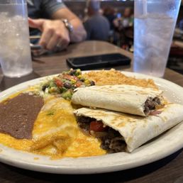Lunch portion quesadilla, rice and taquito Lunch portion quesadilla, rice and taquito
