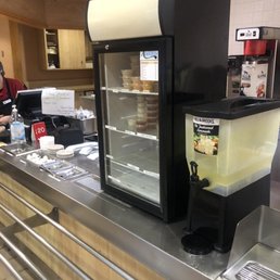 a refrigerated beverage dispenser in a restaurant a refrigerated beverage dispenser in a restaurant