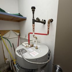 Om Plumbing - Electric water heater