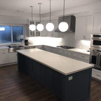 ABA Construction Services - a kitchen with a center island - General Contractors Near Me ABA Construction Services - a kitchen with a center island - General Contractors Near Me