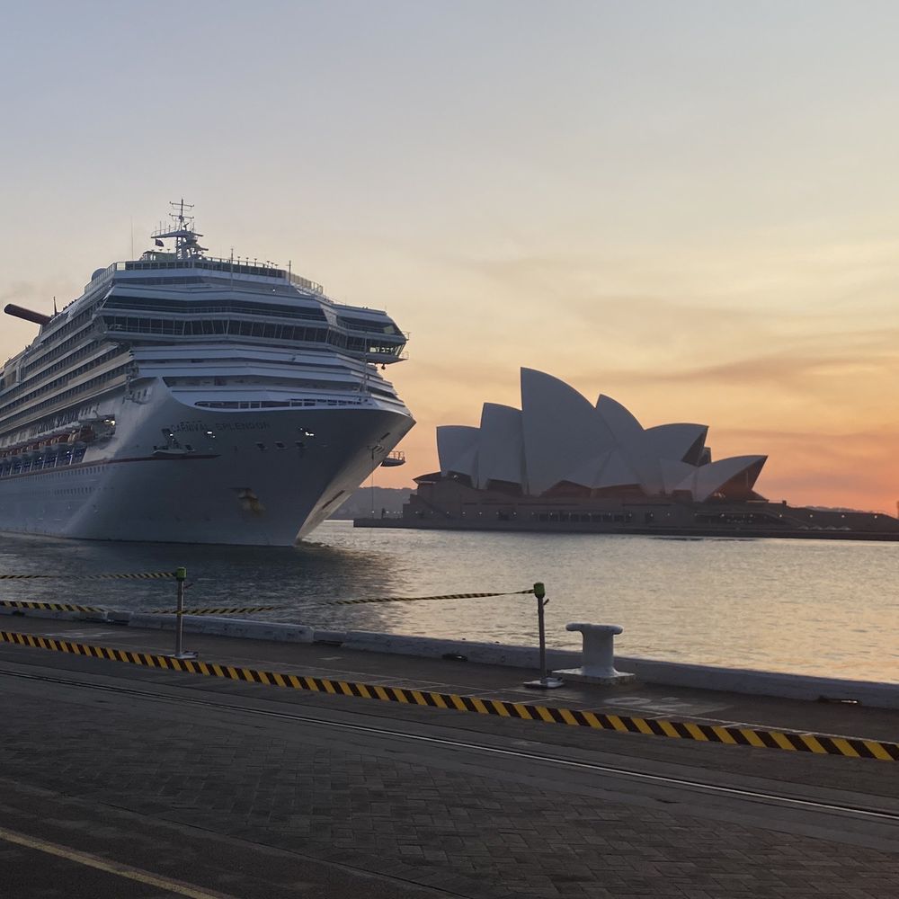 Sunrise and a cruise ship  is pulling in