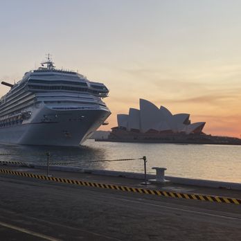 The Rocks - Sunrise and a cruise ship  is pulling in - Local Flavor Near Me