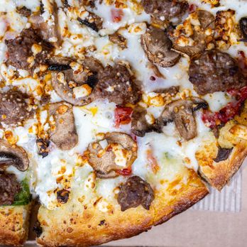 Pizza CasaMia - Via Tuscana (pesto sauce, whole-milk mozzarella cheese, mushrooms, spinach, sun-dried tomatoes, feta cheese and garlic) w/ added Sausage - Pizza Near Me - San Jose, California Pizza CasaMia - Via Tuscana (pesto sauce, whole-milk mozzarella cheese, mushrooms, spinach, sun-dried tomatoes, feta cheese and garlic) w/ added Sausage - Pizza Near Me - San Jose, California