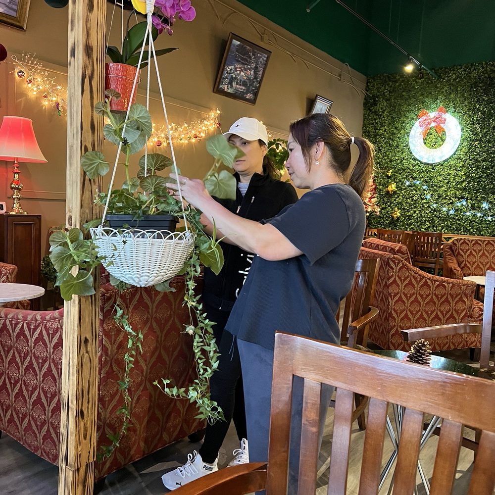 The Quynh Cafe - Owner giving us a cutting - Desserts Near Me - Duluth, Georgia The Quynh Cafe - Owner giving us a cutting - Desserts Near Me - Duluth, Georgia