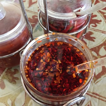 Pho Son Ha - Hot chili oil to add to Pho, highly recommend (but add with caution)! - Vietnamese Near Me - Palatine, Illinois Pho Son Ha - Hot chili oil to add to Pho, highly recommend (but add with caution)! - Vietnamese Near Me - Palatine, Illinois