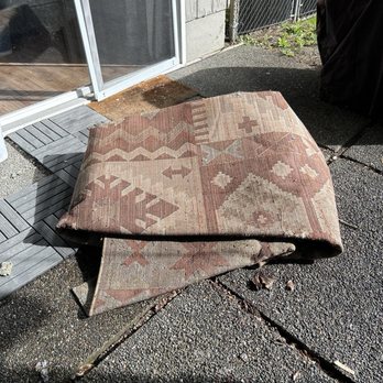 Tired of Trash - Heavy old rug - Junk Removal & Hauling Near Me