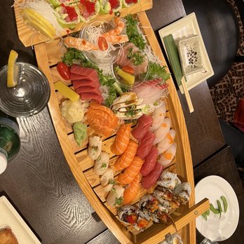 Yoshi Sushi - a wooden boat filled with sushi - Sushi Bars Near Me - Martinsville, New Jersey Yoshi Sushi - a wooden boat filled with sushi - Sushi Bars Near Me - Martinsville, New Jersey