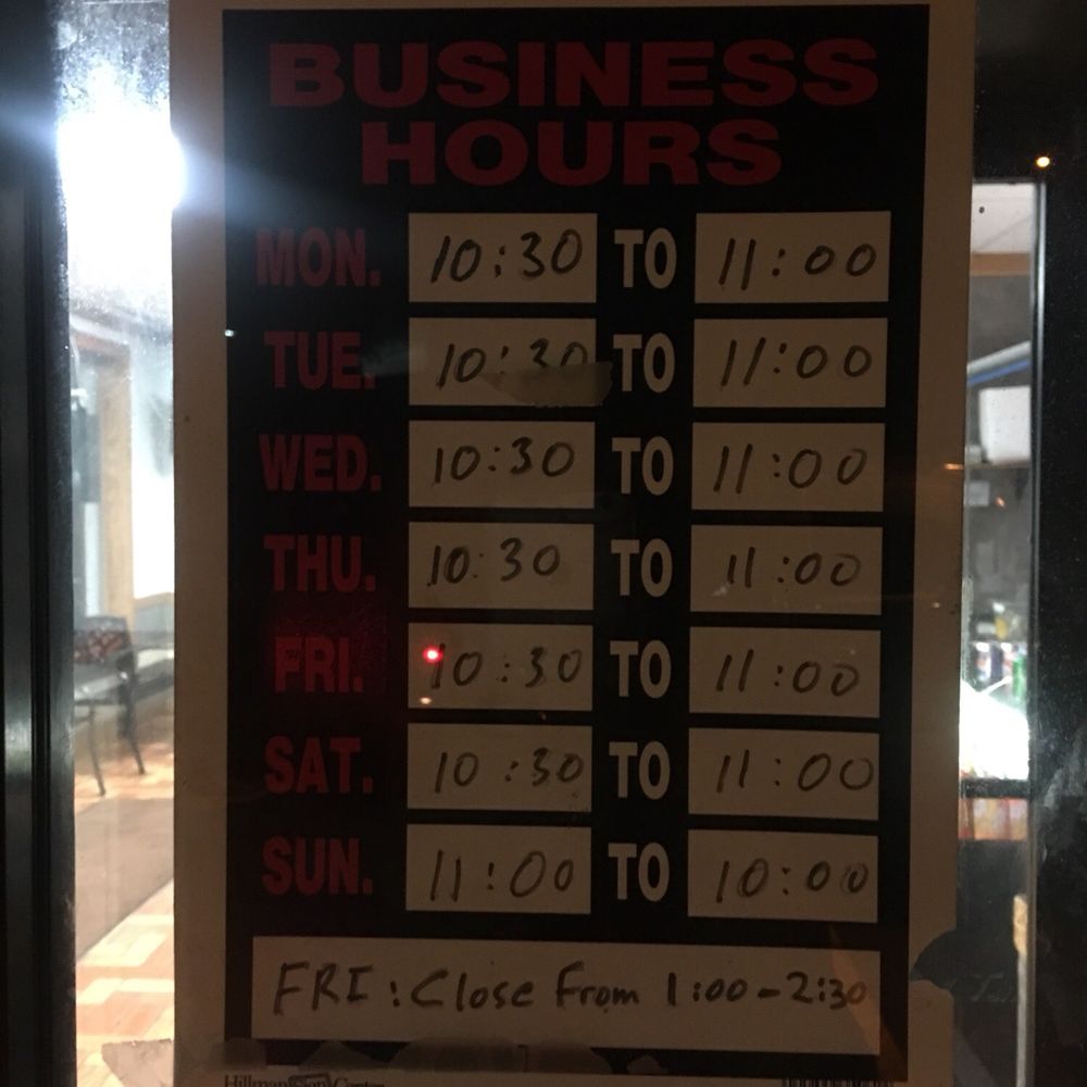 a business hours sign a business hours sign
