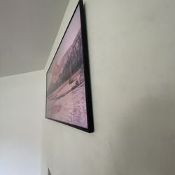 Tech Support Austin - Samsung frame tv mounted on concrete fireplace