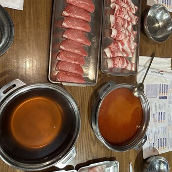 All That Shabu - Spicy Beef broth (top) + sukiyaki (bottom) Beef brisket + Pork Belly + Signature Rib eye + beef belly - Hot Pot Near Me - Irvine, California All That Shabu - Spicy Beef broth (top) + sukiyaki (bottom) Beef brisket + Pork Belly + Signature Rib eye + beef belly - Hot Pot Near Me - Irvine, California