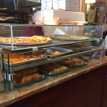 Brooklyn Square Pizza - Slices at counter - Pizza Near Me - Seaford, New York