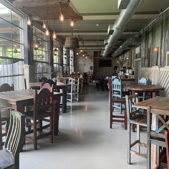 The Bread House & Granary - The dining area with inside and outside seating. - Bakeries Near Me - Albany, Georgia The Bread House & Granary - The dining area with inside and outside seating. - Bakeries Near Me - Albany, Georgia