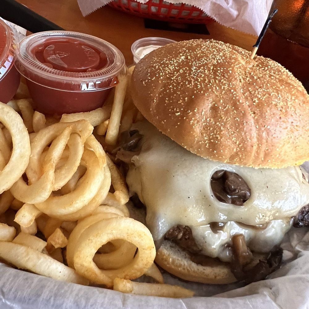 Buffalo's Reef - Mushroom Swiss burger with curly fries - Burgers Near Me - Fort Walton Beach, Florida Buffalo's Reef - Mushroom Swiss burger with curly fries - Burgers Near Me - Fort Walton Beach, Florida