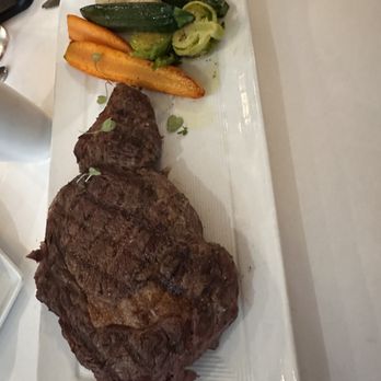 Russell's on Lake Ivanhoe - The Butcher's Cut Ribeye 16oz - American Near Me - Orlando, Florida