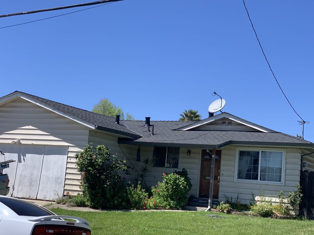 Slide of Lanuza Roofing