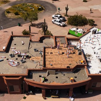 ABRC - A TruCool Lifetime Roof system in progress w/ 2" polyiso insulation substrate. - Roofing Near Me - Tucson, Arizona