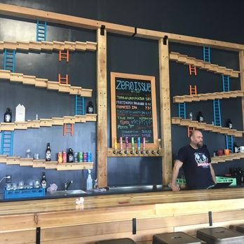 Zero Issue Brewing - a man behind the bar - Breweries Near Me - Calgary, Alberta Zero Issue Brewing - a man behind the bar - Breweries Near Me - Calgary, Alberta