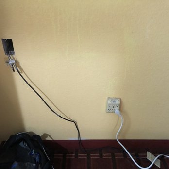 Americas Best Value Inn Canton, MS - Open electric/cable box w wires hanging out, filthy walls and the actual outlet was disgusting - Hotels Near Me - Canton, Mississippi