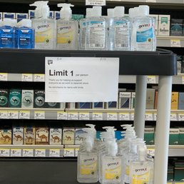 a shelf of hand sanitizers