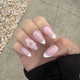 Gel-X manicure, French tips with a 3D Flower.