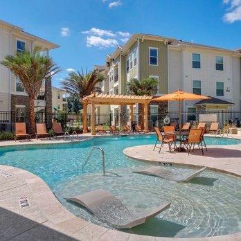 Creekside Crossing - Can't wait to go swimming in the pool. - Apartments Near Me - Walker, Louisiana