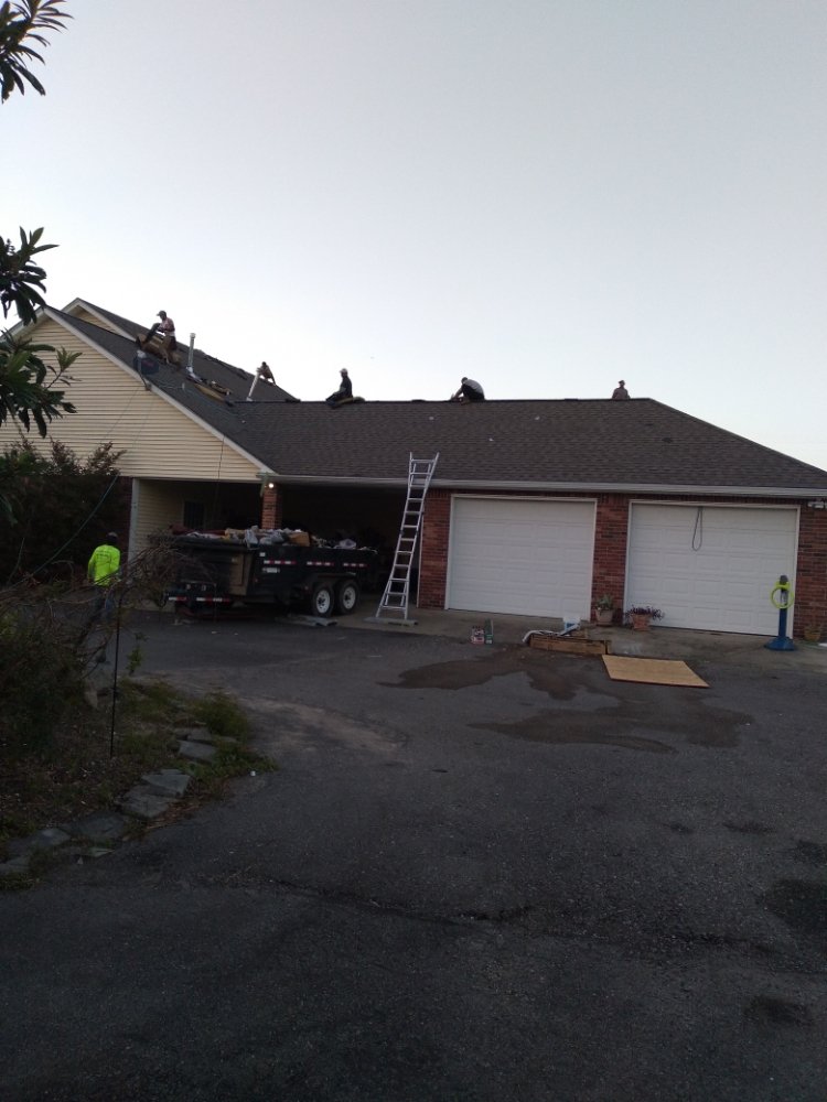 Slide of J&K Roofing Company