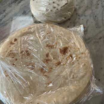 La Perla Tortilleria - Corn tortillas up top and flour on the bottom. - Mexican Near Me - Midland, Texas La Perla Tortilleria - Corn tortillas up top and flour on the bottom. - Mexican Near Me - Midland, Texas