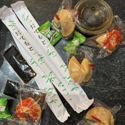 Wong Express House - Take out utensils, candies, dumpling sauce, and Fortune Cookies