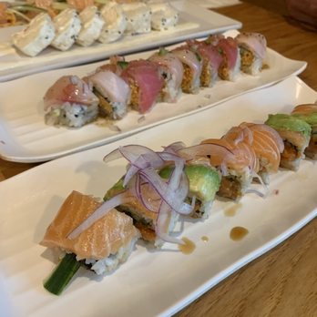 Sushi Junai 2 - (Back to front) Strip Salmon Roll, sweet heart, candy cane, Salmon Lover Roll - Sushi Bars Near Me - Austin, Texas Sushi Junai 2 - (Back to front) Strip Salmon Roll, sweet heart, candy cane, Salmon Lover Roll - Sushi Bars Near Me - Austin, Texas
