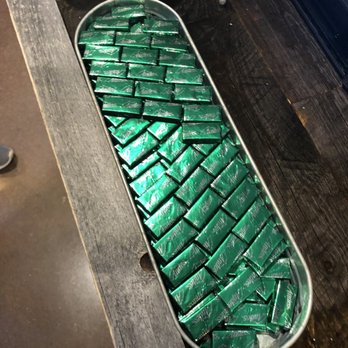 Cunningham's Journal on the Bricks - Andes Mints at the reception desk - Bars Near Me - Kearney, Nebraska