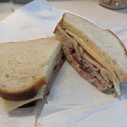 Roast Turkey with Swiss cheese and Cranberry sauce. Roast Turkey with Swiss cheese and Cranberry sauce.
