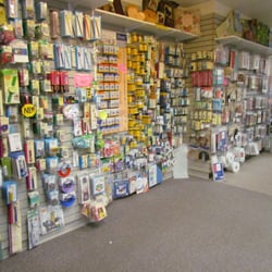 Back wall of the store is full of notions.