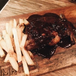Mati's Meat & Bread - Baby back ribs with the most repulsive BBQ sauce