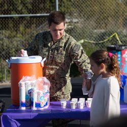 Silver Gate Elementary School - Passing out water at the Gator Run