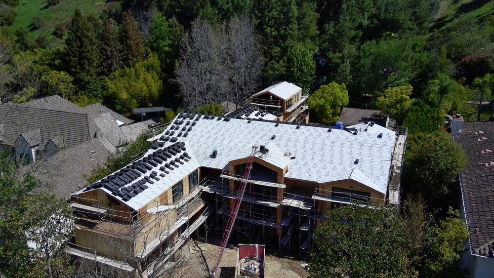 Slide of Confirmed Roofing Experts