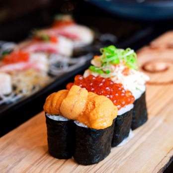 Thai Amarin - a variety of sushi on a wooden board - Thai Near Me - Newton Corner, Massachusetts